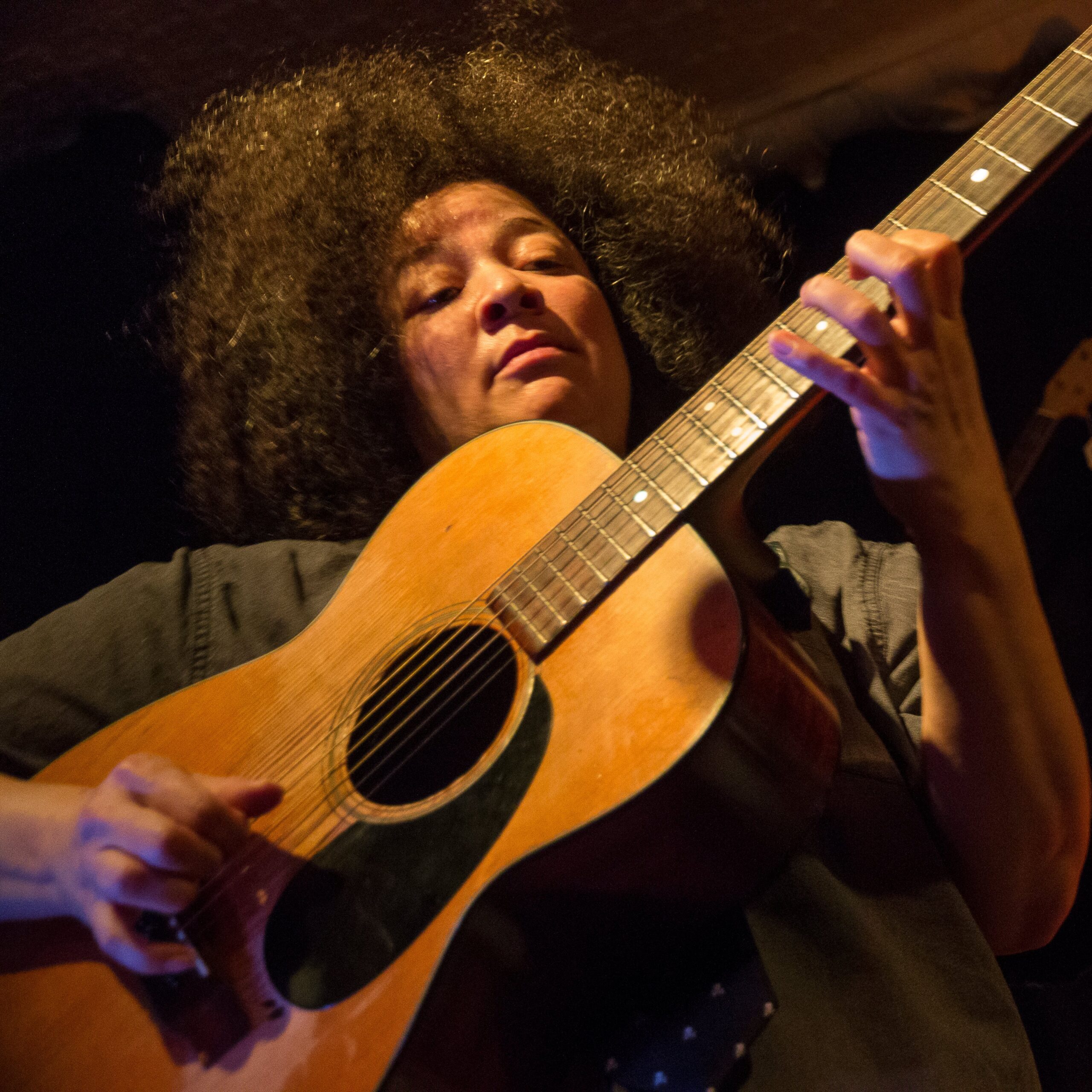 Pamela Means pic w guitar by Julian Parker-Burns lo-res - Pamela Means